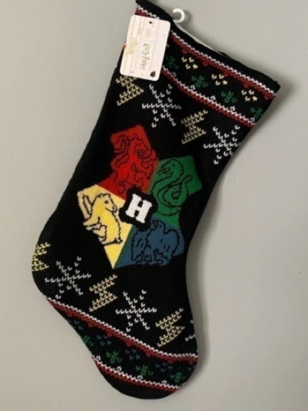 Holiday Crest Knit Stocking - Black with Red, Green, Yellow, Blue Accents